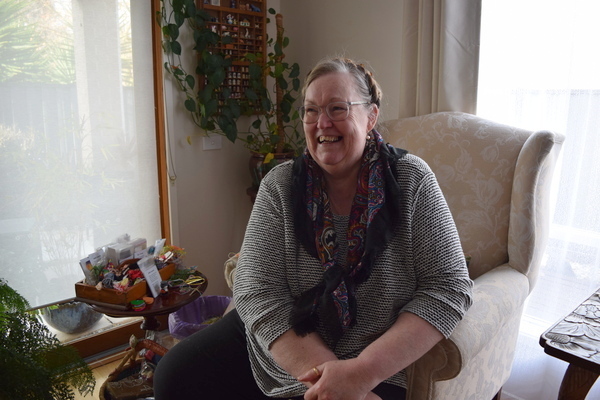 Ingrid_600x400 Ingrid Mitchell sits in an armchair next to her craft supplies