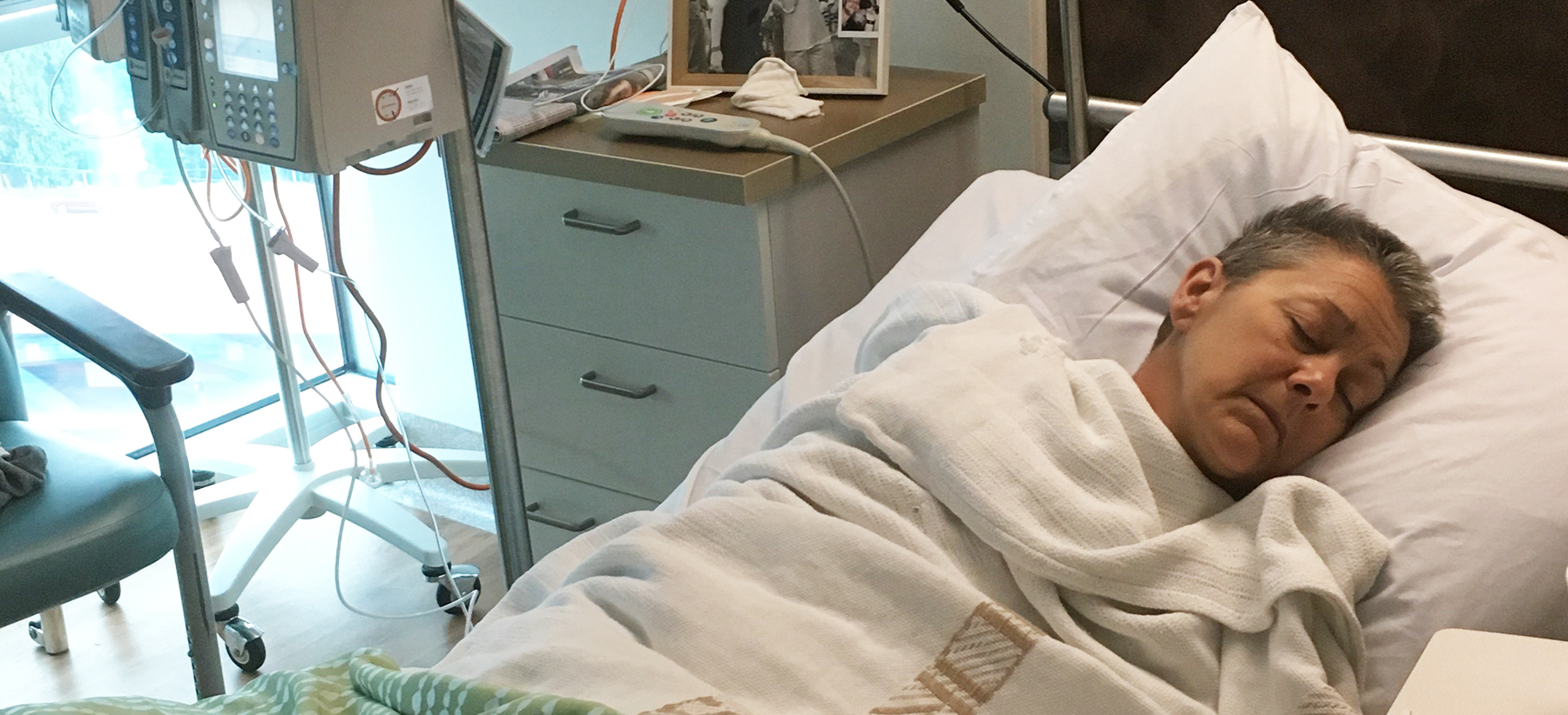 Moya in hospital bed quite sick 1800x826px