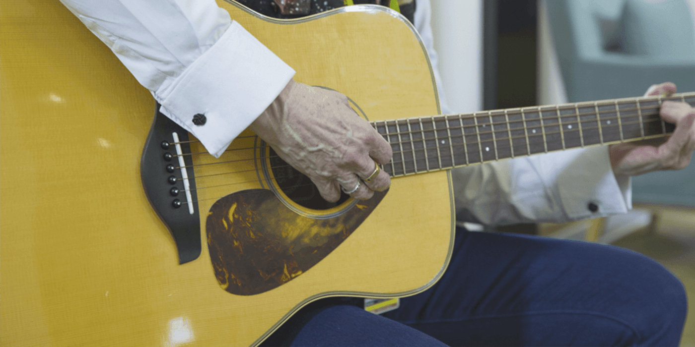 volunteerplayingguitar